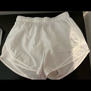 White Nike shorts